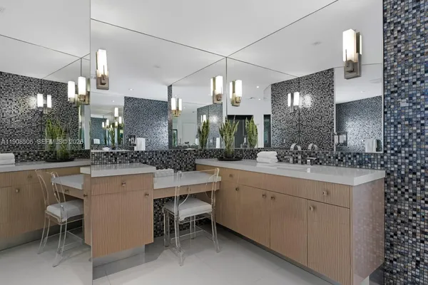 a kitchen with a sink and stove