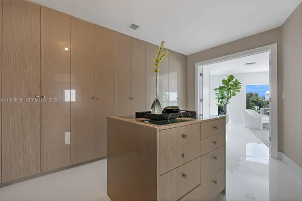 a kitchen with stainless steel appliances a stove and a refrigerator