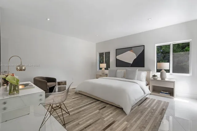 a bathroom with a bathtub and a sink