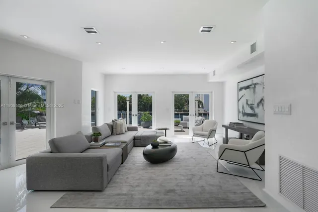 a spacious bathroom with a bathtub sink and mirror