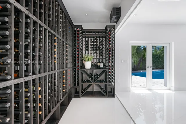 an aerial view of a house with a lake view