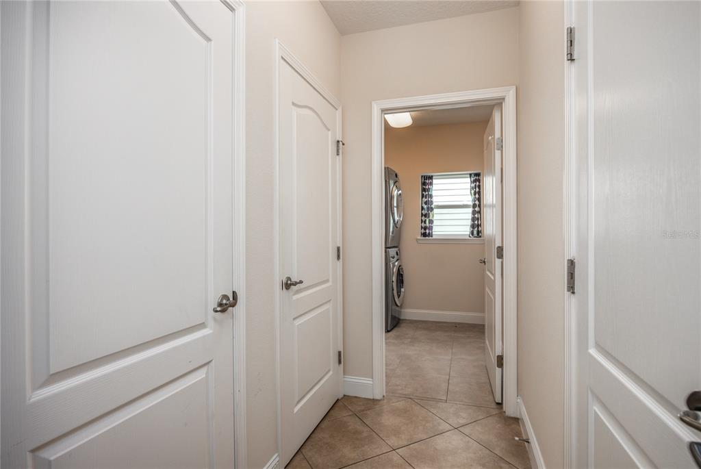 8216 Northwest 54th Street Gainesville, FL 32653 - Photo 12 of 58 a view of a bathroom from a hallway with toilet