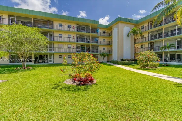 a front view of building with an outdoor space