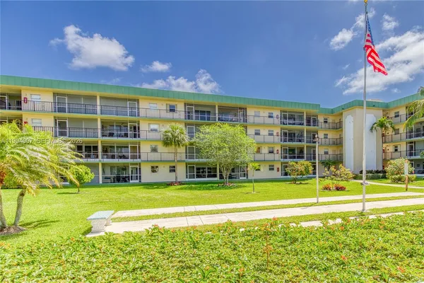 a view of a house with a swimming pool