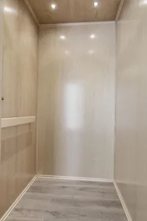 a bathroom with a large tub a shower and sink