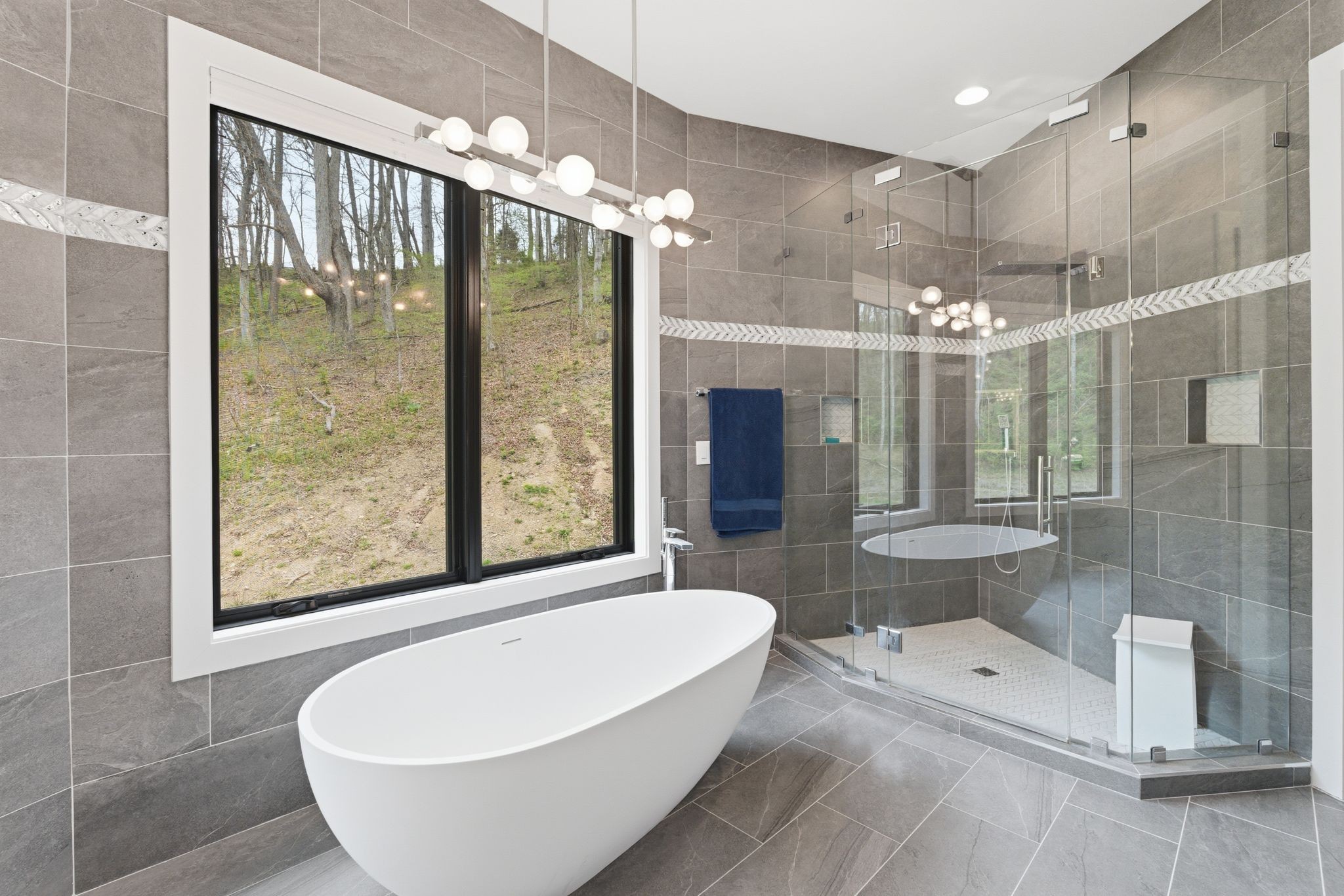1751 Cayce Springs Road Thompson's Station, TN 37179 - Photo 50 of 86 a bathroom with a large tub a shower and sink
