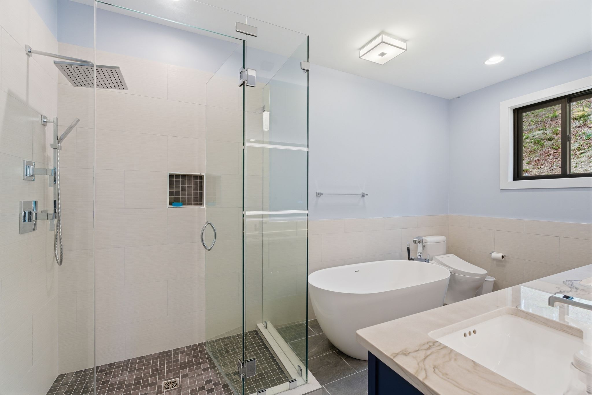1751 Cayce Springs Road Thompson's Station, TN 37179 - Photo 61 of 86 a bathroom with a sink and mirror with toilet