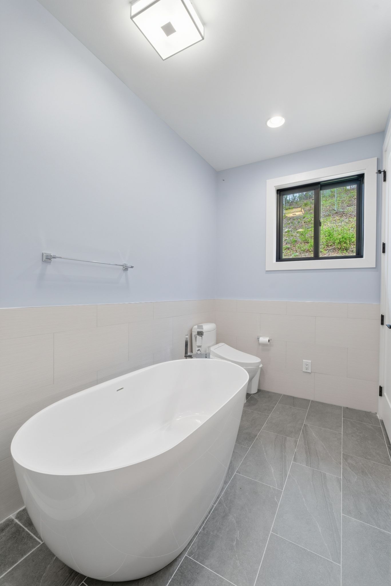 1751 Cayce Springs Road Thompson's Station, TN 37179 - Photo 63 of 86 a view of a bathtub in a room
