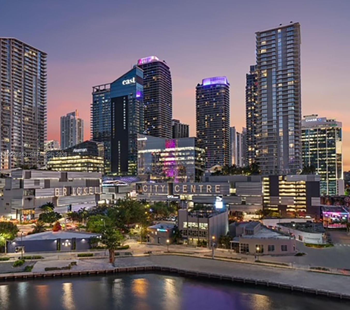 68 Southeast 6th Street, Unit 2702 Miami, FL 33131 - Photo 15 of 28 a city street filled with lots of tall buildings