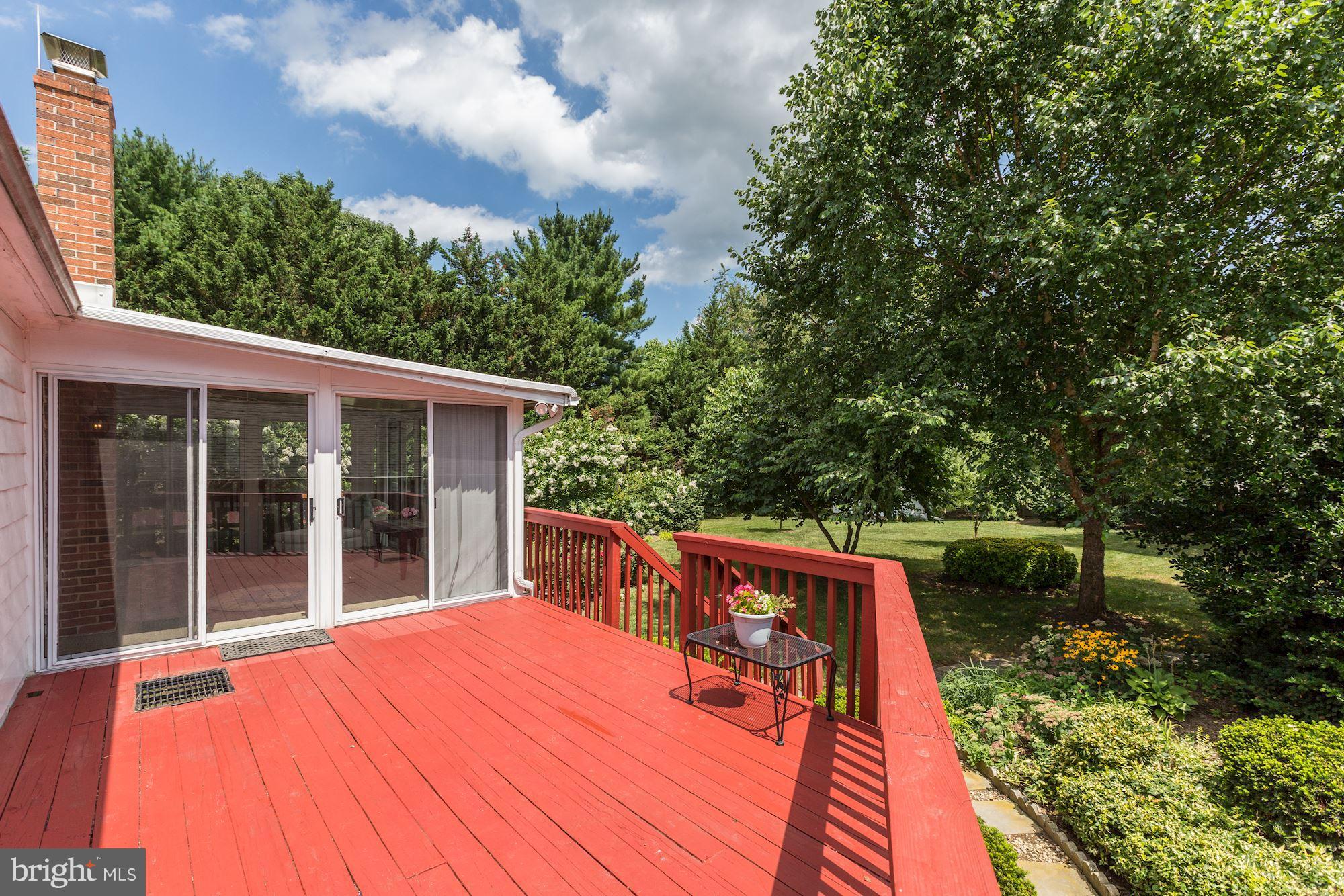 10917 Rawley Road New Market, MD 21774 - Photo 22 of 30 Spacious deck connecting to the 3 Season Sun Room
