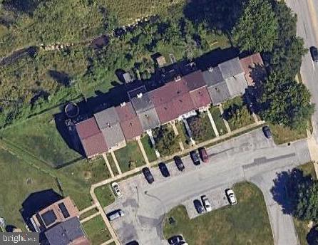 21 Neves Court Baltimore, MD 21234 - Photo 2 of 2 an aerial view of a house with a yard and lake view