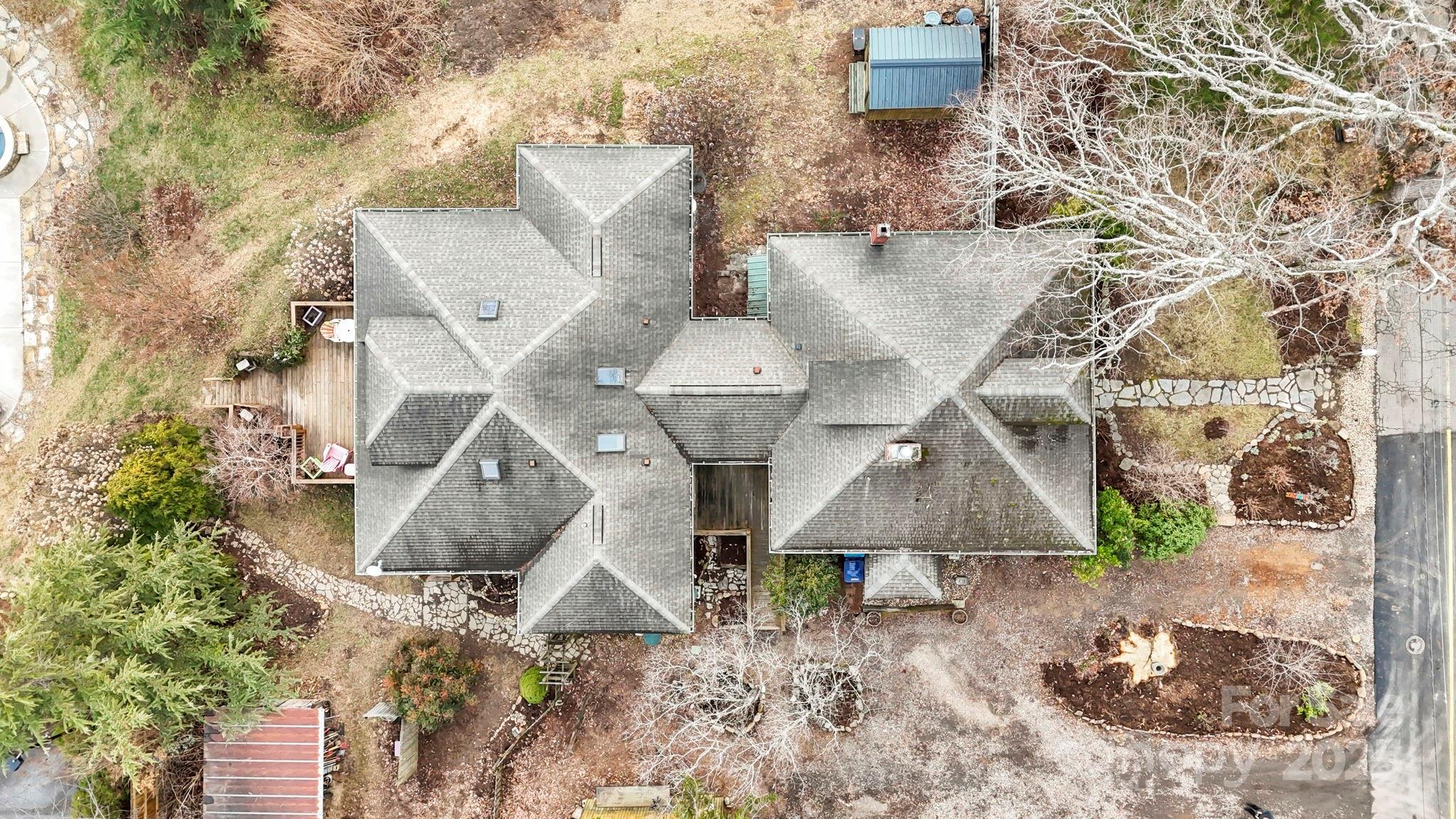 104 Enthoffer Road Black Mountain, NC 28711 - Photo 35 of 42 an aerial view of a house with a yard and wooden fence