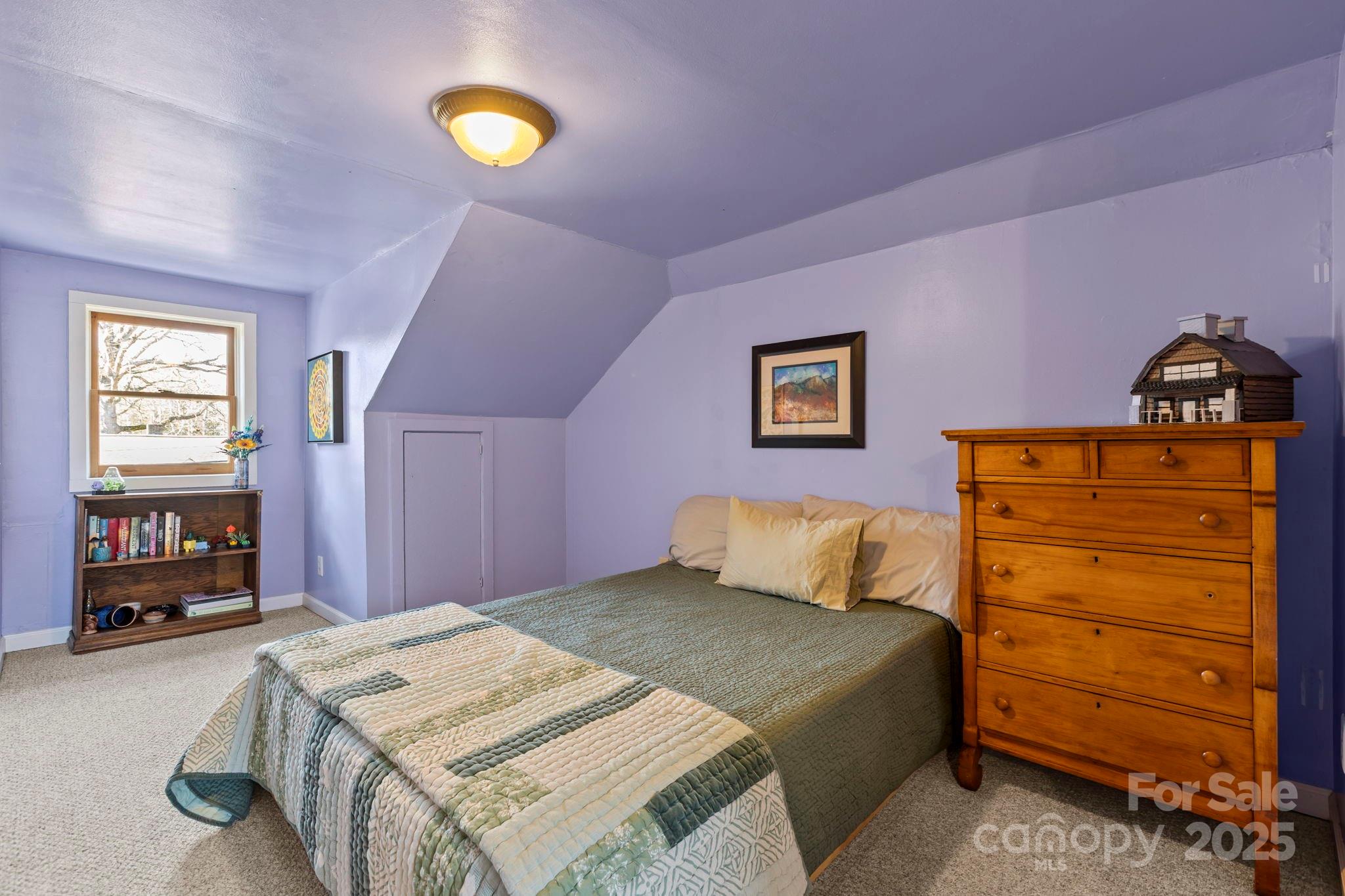 104 Enthoffer Road Black Mountain, NC 28711 - Photo 10 of 42 a bedroom with a bed and furniture