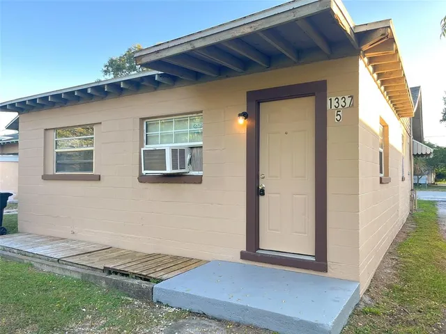 a front view of a house with yard