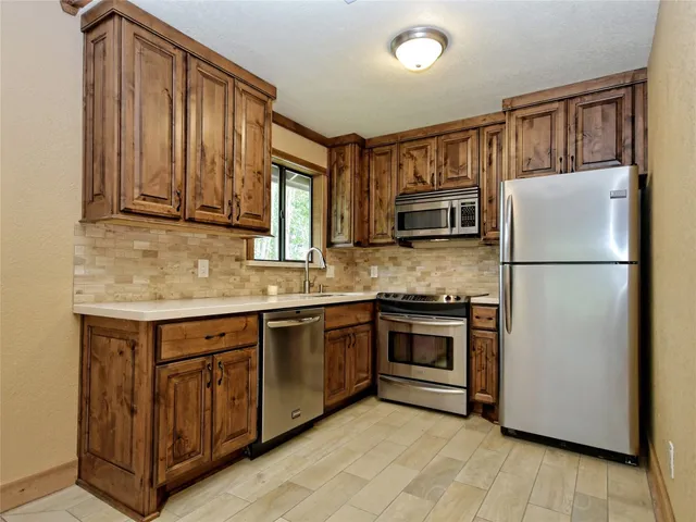 $1,750 | 154 Woodcreek Drive, Unit 13, Wimberley, TX 78676