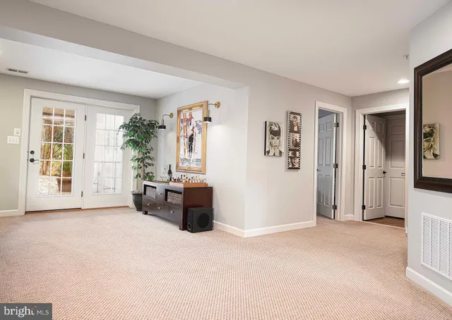 a view of a a dining room with furniture window and wooden floor