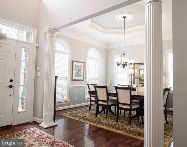 a kitchen with stainless steel appliances granite countertop a sink a stove microwave and cabinets