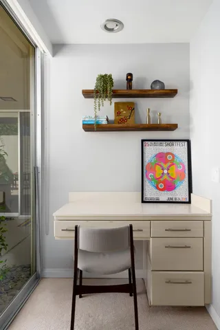 a bathroom with a double vanity sink and mirror