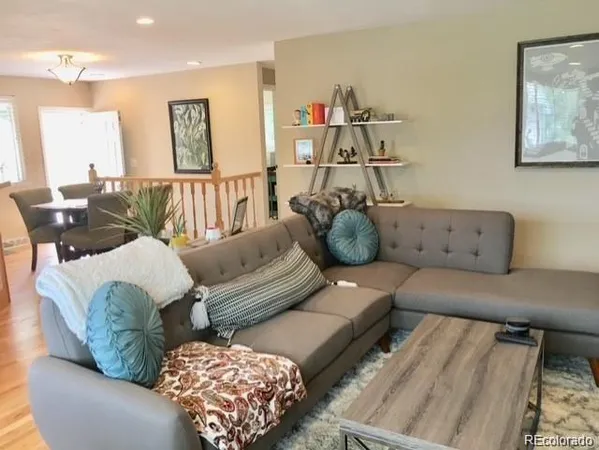a living room with furniture and a couch