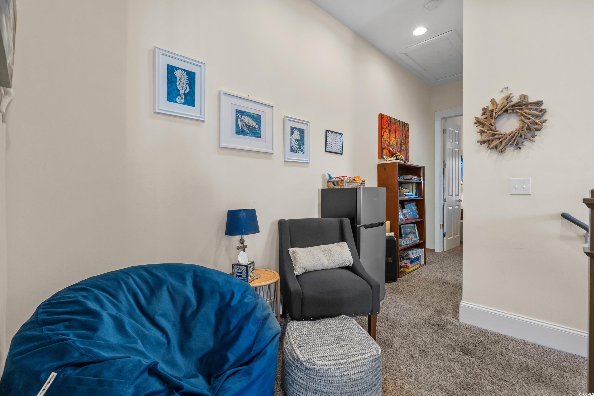 2794E Howard Avenue, Unit A Myrtle Beach, SC 29577 - Photo 16 of 40 Living area with carpet flooring and recessed lighting