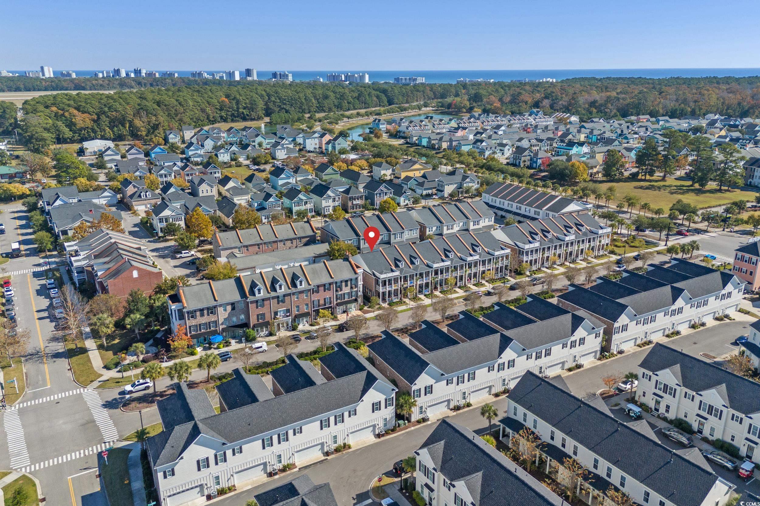 2794E Howard Avenue, Unit A Myrtle Beach, SC 29577 - Photo 31 of 40 Aerial overview of property's location featuring a nearby body of water and nearby urban area