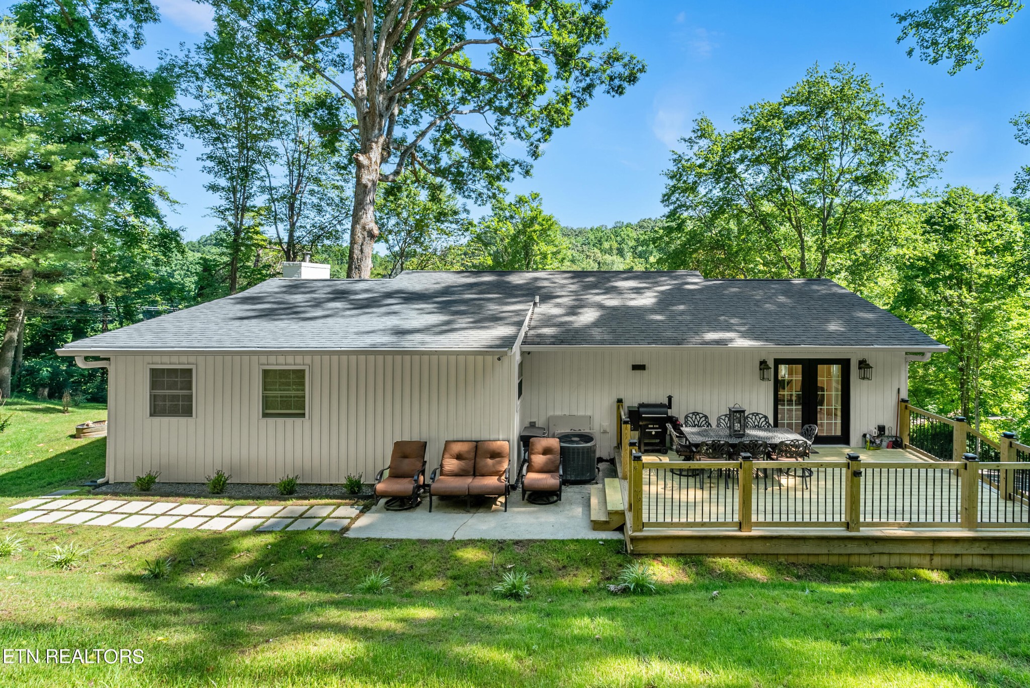 337 Farmer's Hollow Road Clinton, TN 37716 - Photo 11 of 49 a house view with swimming pool and garden space