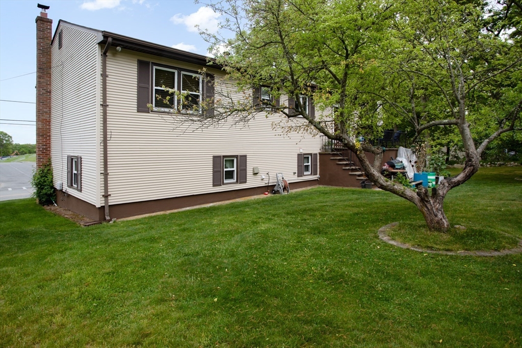 166 Stonehaven Road Fall River, MA 02723 - Photo 30 of 33 a front view of house with a garden