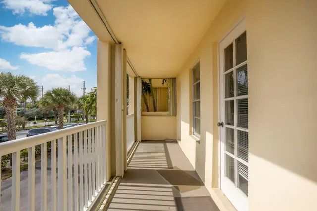 a kitchen with a sink stove and microwave