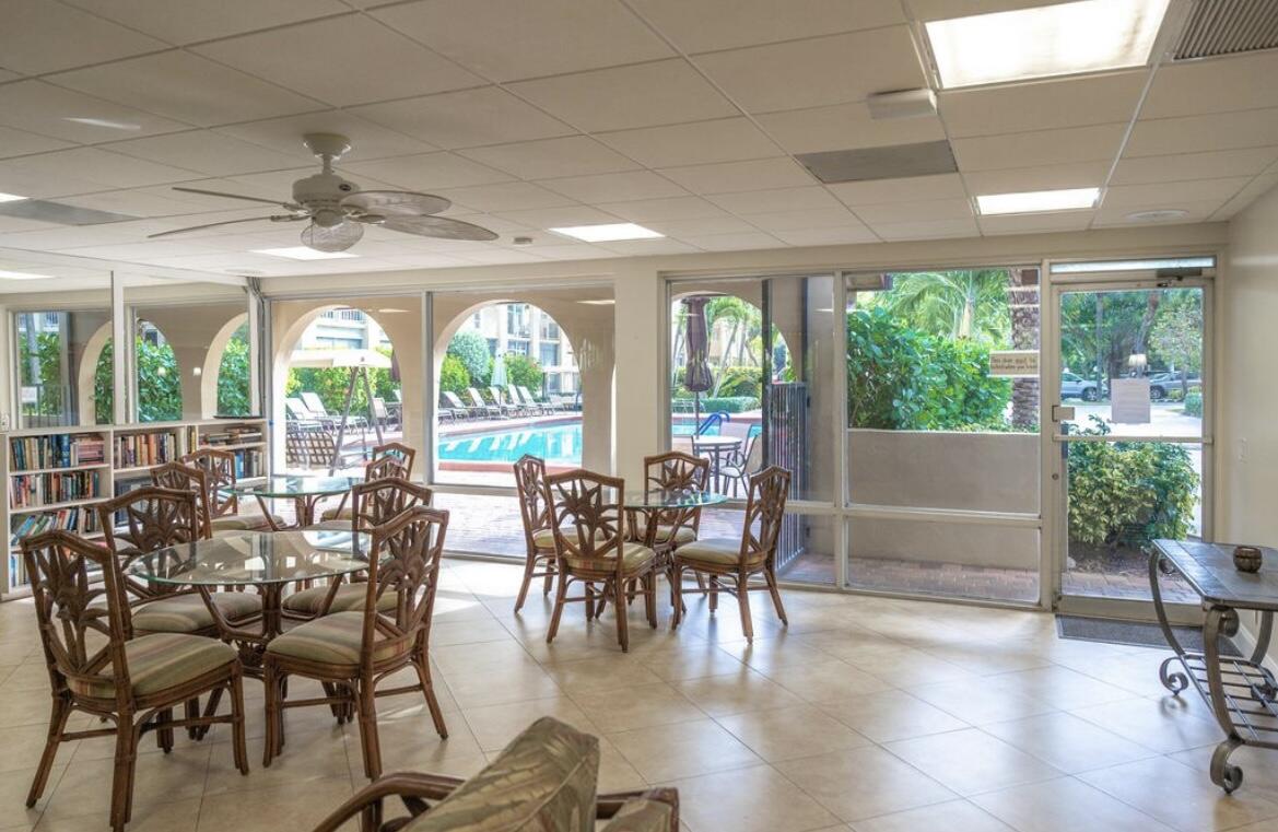 951 De Soto Road, Unit 2300 Boca Raton, FL 33432 - Photo 23 of 29 a view of a dining room with furniture window and outside view
