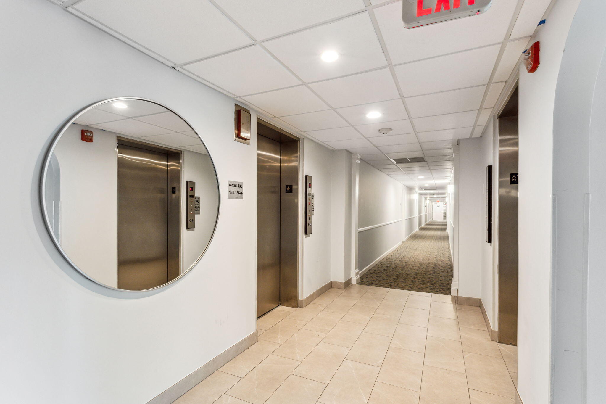 951 De Soto Road, Unit 2300 Boca Raton, FL 33432 - Photo 5 of 29 a view of a hallway with entryway painted walls and entryway