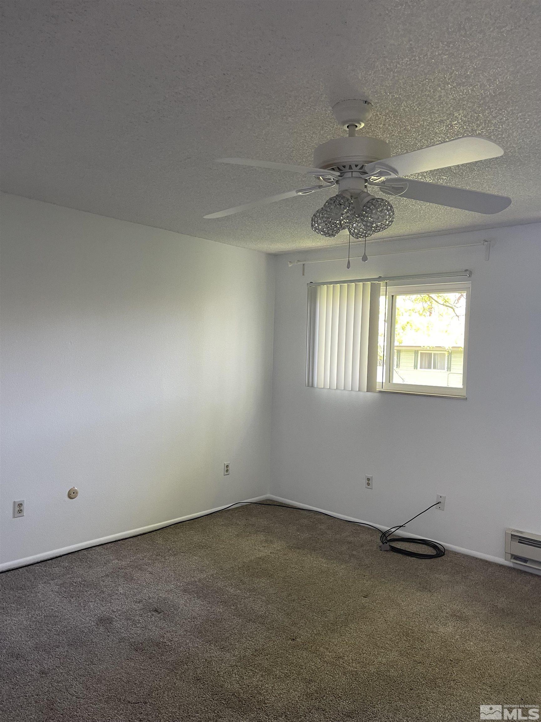 325 Smithridge Park Reno, NV 89502 - Photo 11 of 16 an empty room with a window