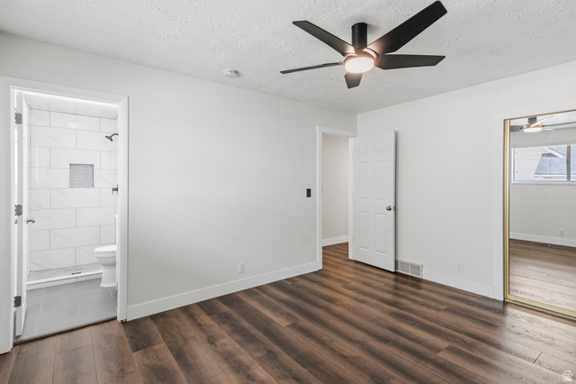 2693 Teal Way Sandy, UT 84093 - Photo 10 of 50 Spacious room featuring wood-finish flooring, a modern black ceiling fan with integrated lighting, and a mirrored closet door