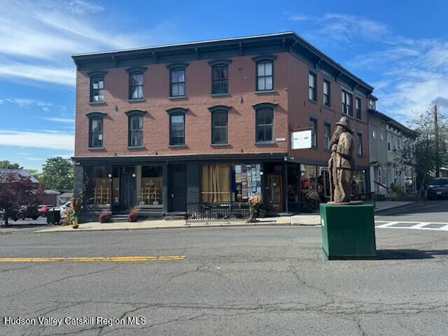 473 Main Street, Unit 1 Catskill, NY 12414 - Photo 1 of 8 a front view of a building with street