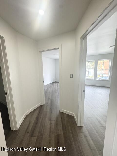 473 Main Street, Unit 1 Catskill, NY 12414 - Photo 5 of 8 wooden floor in an empty room