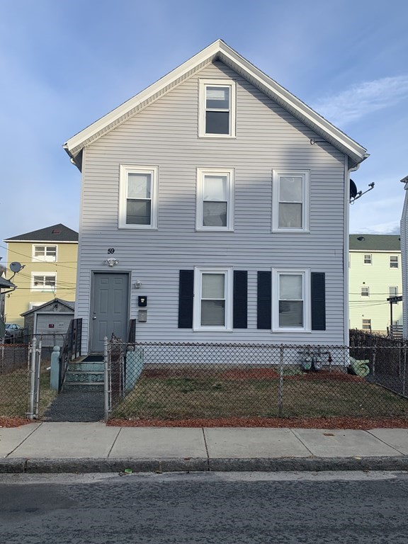 59 Eastern Avenue Worcester, MA 01605 - Photo 2 of 7 a front view of a house