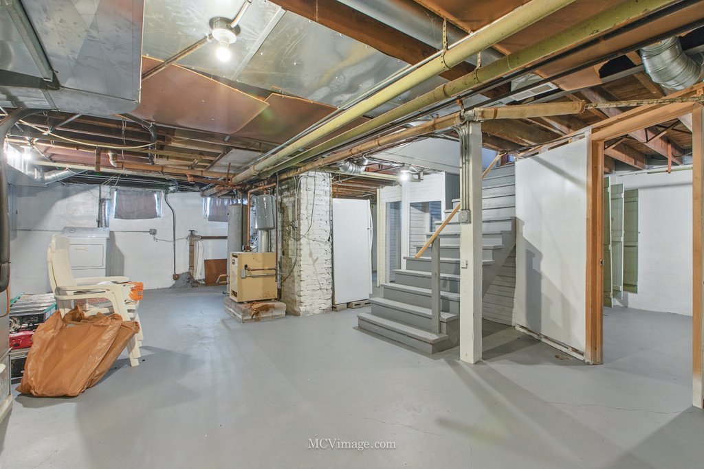 10130 South Lowe Avenue Chicago, IL 60628 - Photo 19 of 23 a view of storage and utility room