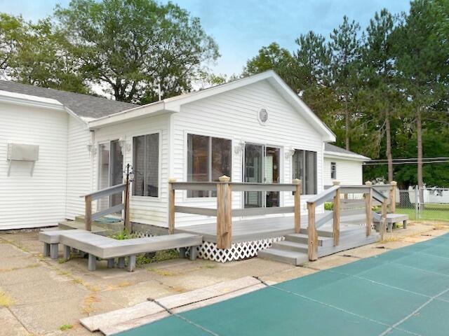 273 South Reynolds Road Winslow, ME 04901 - Photo 30 of 40 Sunroom, deck & in-ground pool