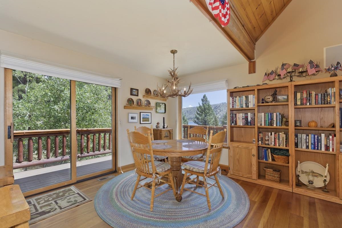11650 Twin Lakes Road Bridgeport, CA 93517 - Photo 13 of 39 Dining area featuring a chandelier and wood finished floors