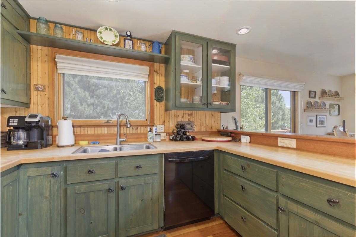 11650 Twin Lakes Road Bridgeport, CA 93517 - Photo 17 of 39 Kitchen featuring green cabinetry, dishwasher, light countertops, and recessed lighting