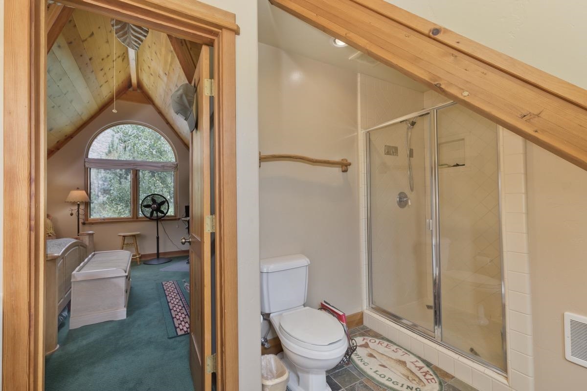 11650 Twin Lakes Road Bridgeport, CA 93517 - Photo 23 of 39 Bathroom with a shower stall and vaulted ceiling