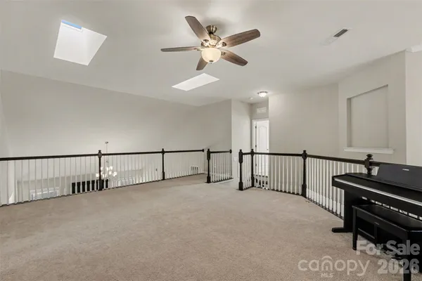 a view of a livingroom with furniture