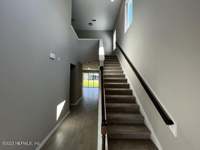 47 Goldcrest Way St. Augustine, FL 32092 - Photo 3 of 10 a view of entryway and hall with wooden floor