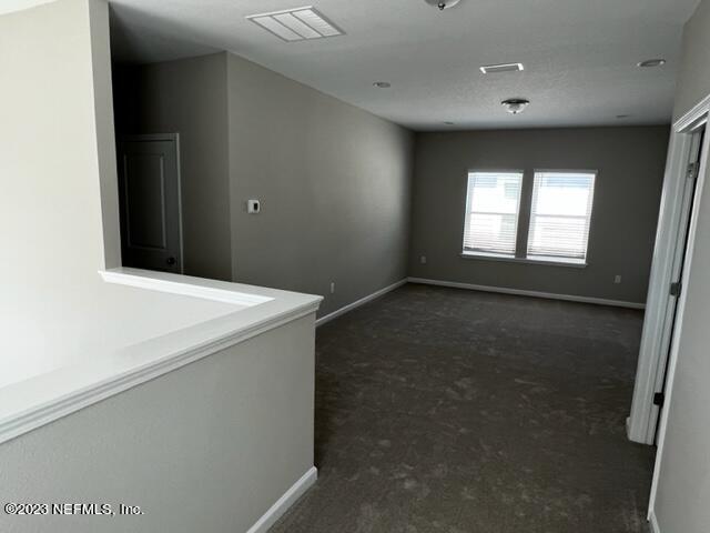 47 Goldcrest Way St. Augustine, FL 32092 - Photo 7 of 10 a view of an empty room and window