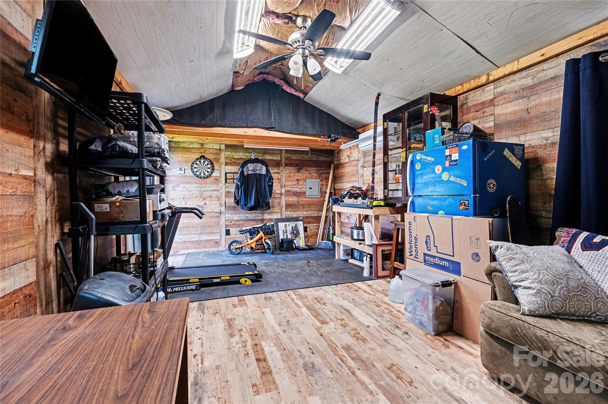 1175 Old Salisbury-Concord Road Concord, NC 28025 - Photo 14 of 31 a view of a living room with furniture and a flat screen tv