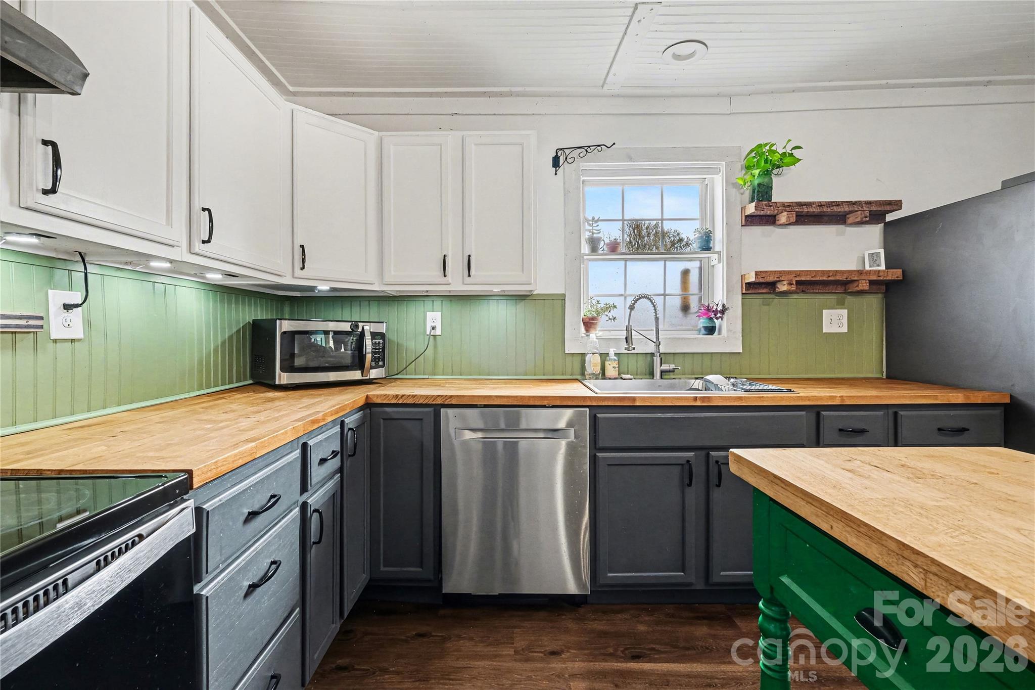 1175 Old Salisbury-Concord Road Concord, NC 28025 - Photo 19 of 31 a kitchen with a sink and cabinets