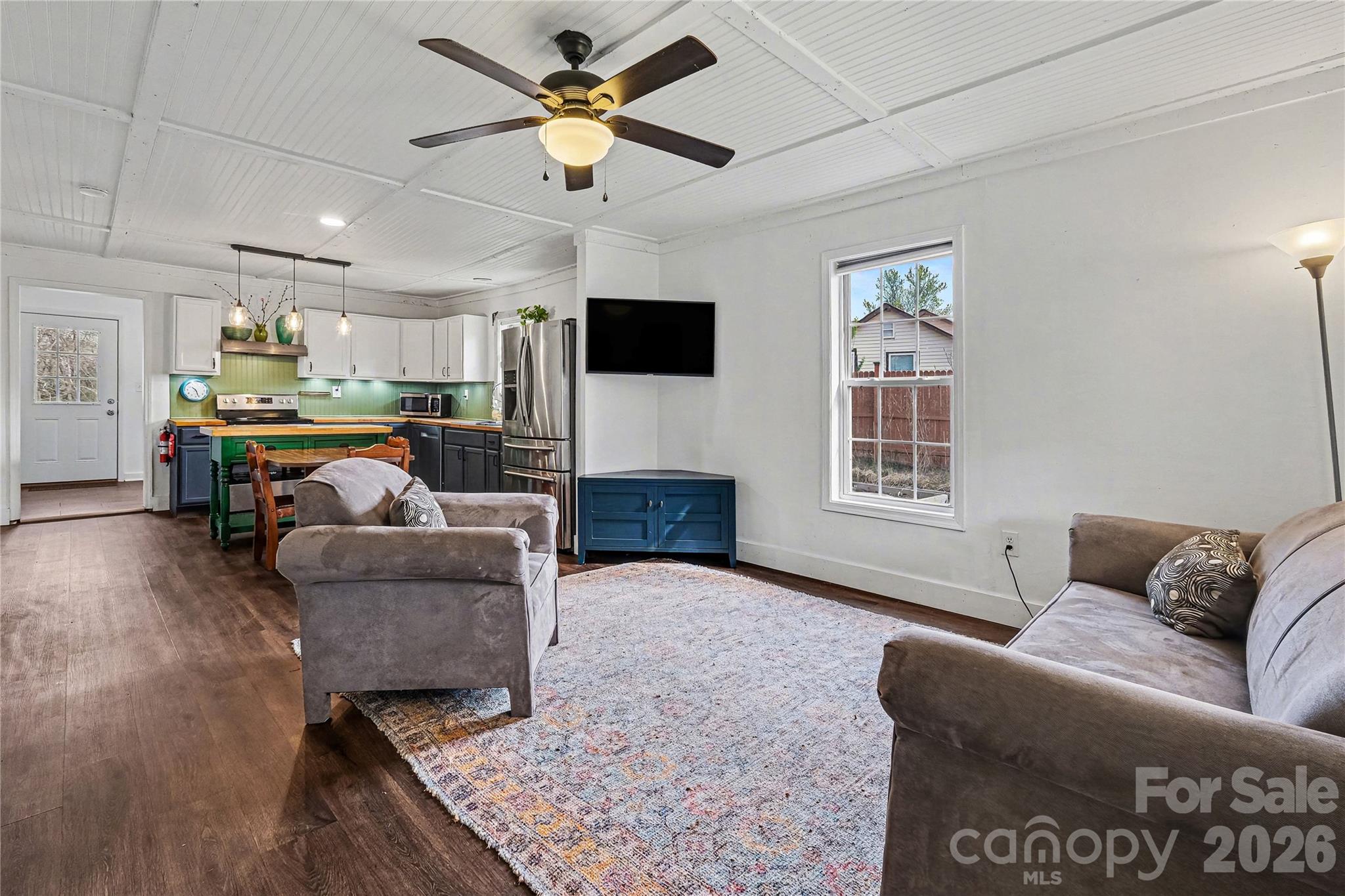 1175 Old Salisbury-Concord Road Concord, NC 28025 - Photo 25 of 31 a living room with furniture and a flat screen tv