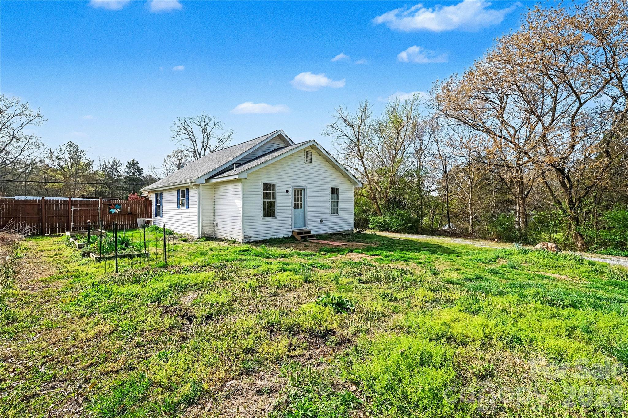 1175 Old Salisbury-Concord Road Concord, NC 28025 - Photo 29 of 31 a view of a backyard with plants and trees