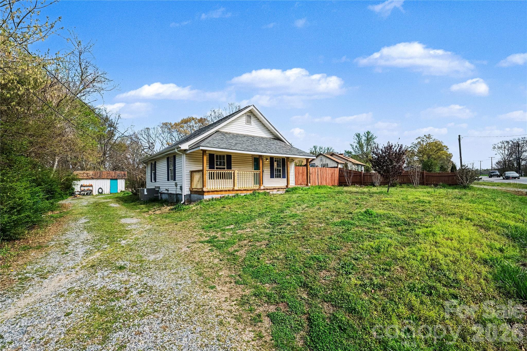 1175 Old Salisbury-Concord Road Concord, NC 28025 - Photo 4 of 31 a front view of a house with garden