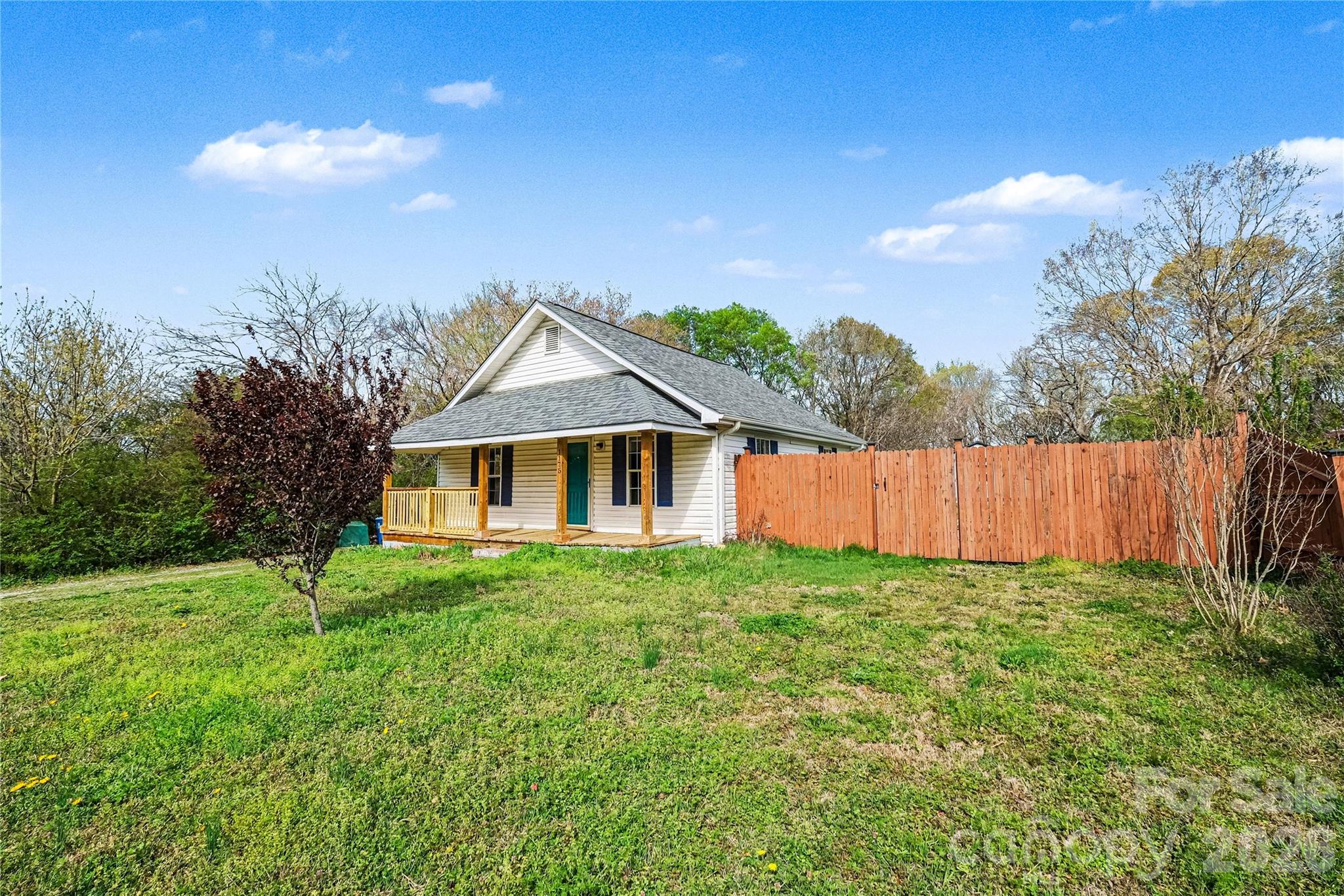 1175 Old Salisbury-Concord Road Concord, NC 28025 - Photo 5 of 31 a front view of a house with yard and green space
