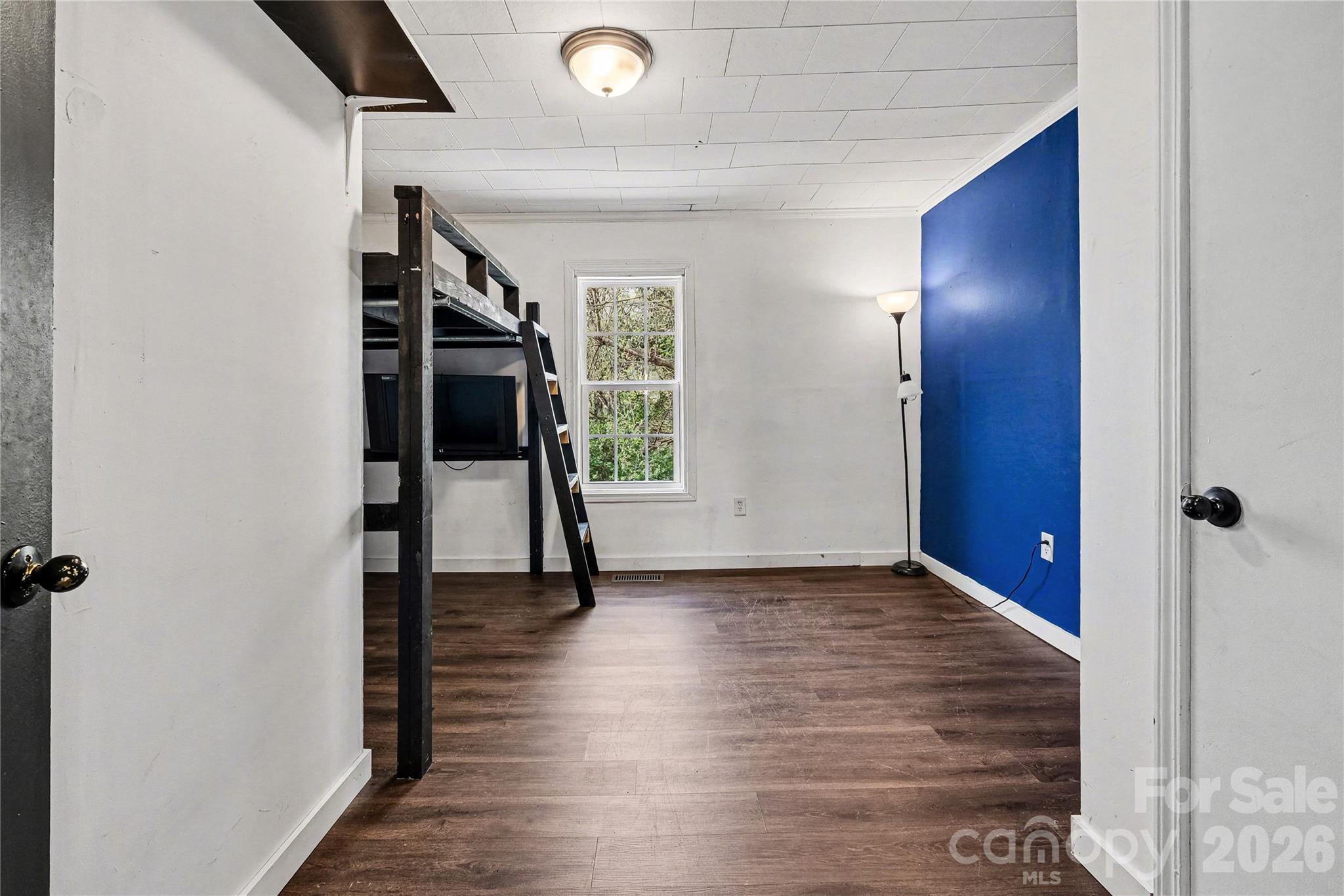 1175 Old Salisbury-Concord Road Concord, NC 28025 - Photo 6 of 31 a view of hallway with stairs and wooden floor
